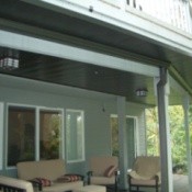 View of upper deck and patio below.