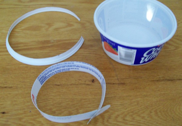 Cut up whipped topping container.