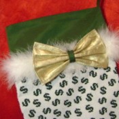 White fabric with green dollar sign print.