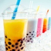 Row of Colorful Drinks on Ice