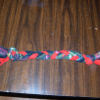 Braided Fleece Dog Toy - finished lying on a table