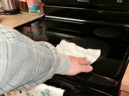 Cleaning a smoothtop stove.
