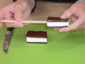 Inserting ice cream stick.