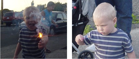 A child with a sparkler lit and then out.