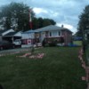 Canadian flags decorating a home and yard.