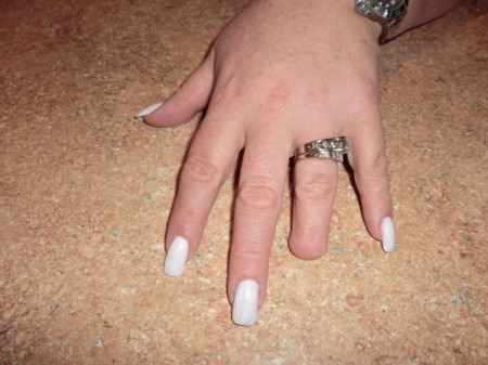 nails painted with white polish