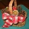 Basket filled with pinecones.