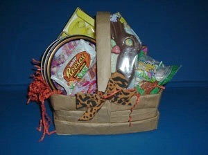 Finished basket decorated and filled with Easter candy.