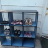 A bookshelf to organize shoes