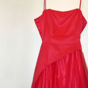 A red spaghetti strap prom dress