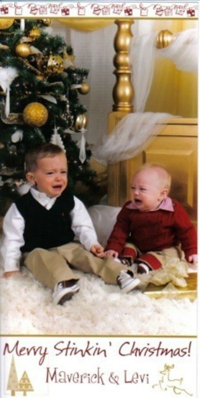 Two boys crying in front of tree