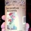 Bottle of Decorative Accents hydrated polymer beads.