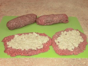 Stuffing spread on steaks.