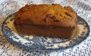 Pumpkin bread on blue and white plate.