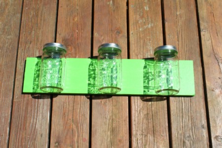 Canning Jars on green wood