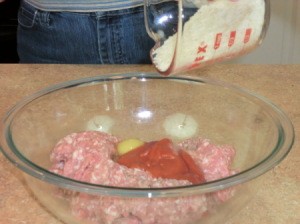 Adding additional ingredients to meat.