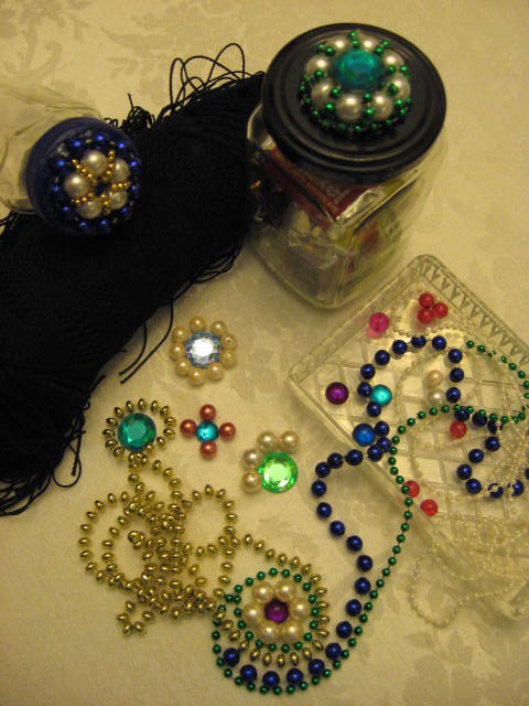 Motif examples, beads, and finished lids.