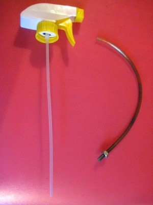 Sprayer and aquarium tube with nut attached.