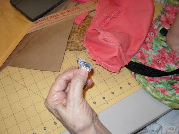 Sewing on Buttons for Crafts with a needle threader