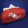 A small red first aid kit