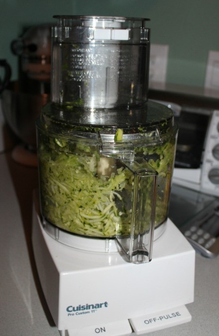Shredded zucchini in food processor