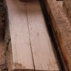 Oak plank with cracks.