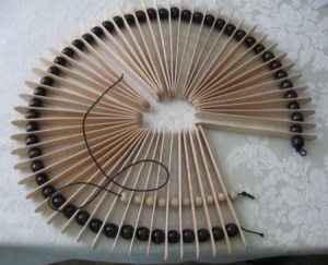 Threading smaller beads.