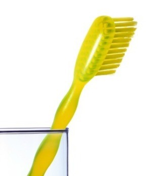 Using a Toothbrush for Cleaning