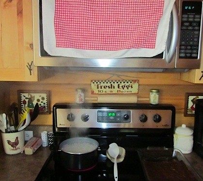 Use a Towel to Catch Steam from Cooking
