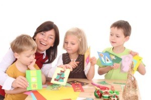Woman Making Greeting Cards With Children
