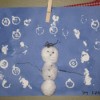 A simple snow scene with paint and cotton balls.