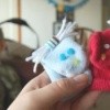 Two sock puppets made from baby socks.