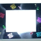 A frame decorated with confetti