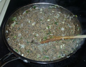 $10 Dinners: Soft Tacos - Ground beef being cooked with onions, garlic and peppers.