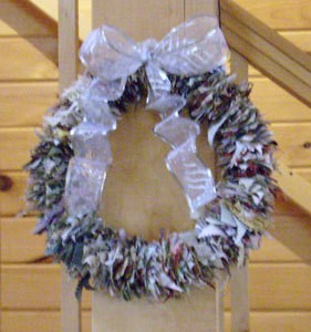 Christmas wreath made from crafting scrap fabric pieces.