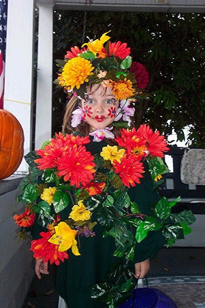 Little girl dressed as a flower garden.