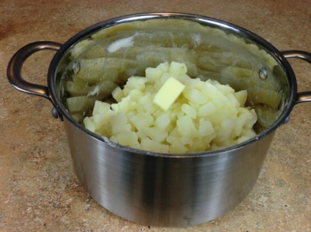 add butter to potatoes
