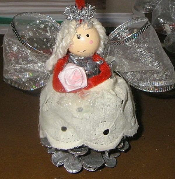 An angel pinecone Christmas ornament