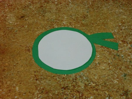 small circle on scarf