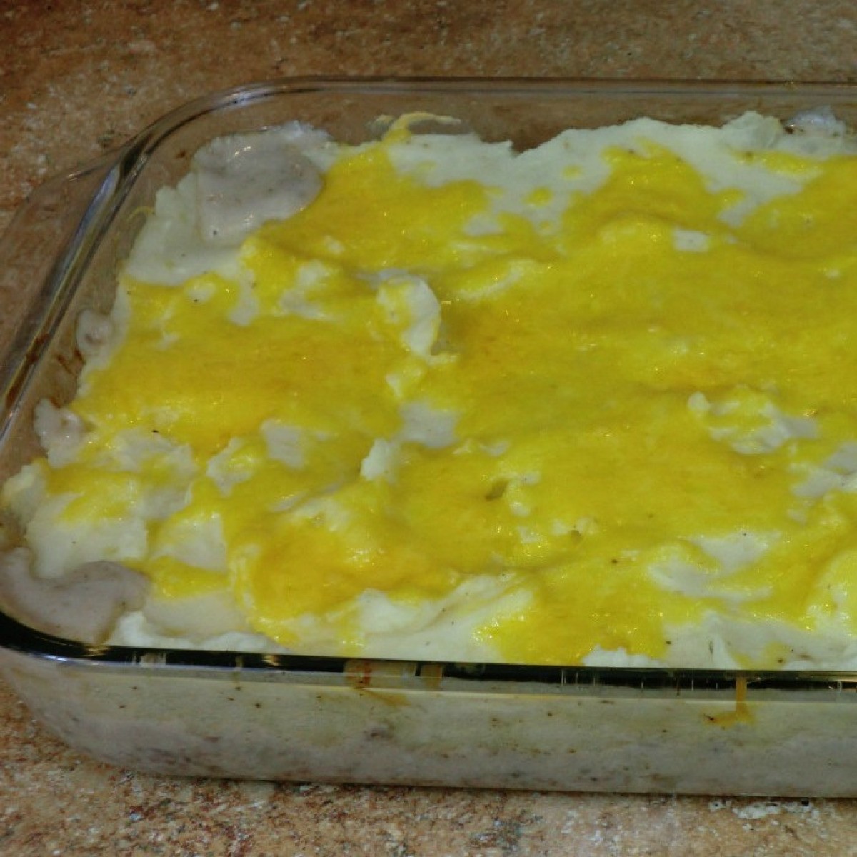 Making Mashed Potato Hamburger Casserole | ThriftyFun