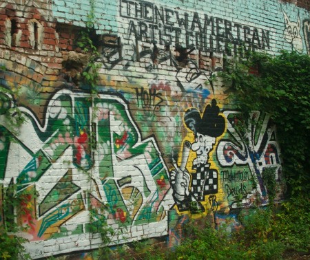 Graffiti on old brick wall.