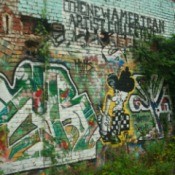Graffiti on old brick wall.