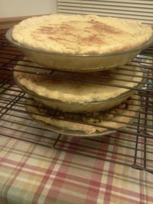 Three pies on cooling rack.