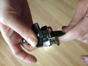 Separating keyring with staple puller.