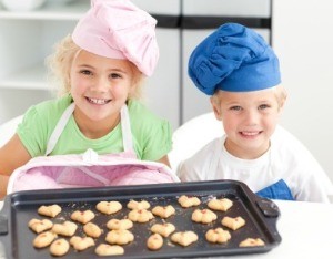 Young Boy and Girl Baking Cookies
