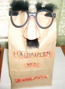 Brown paper bag kit with fun glasses.