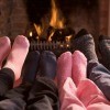family Warming Feet by Fire