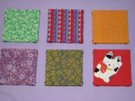 Examples of wall hangings made with scrap fabrics.