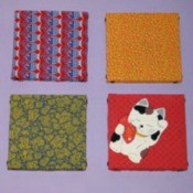 Examples of wall hangings made with scrap fabrics.