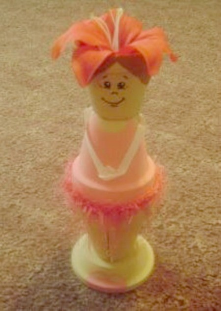 Cute ballerina made from clay flower pots.